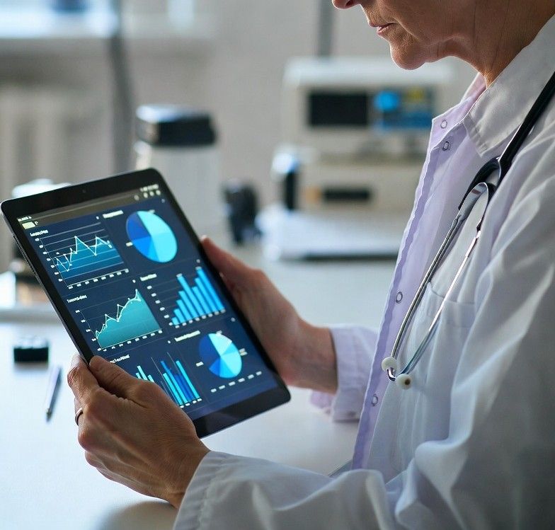 veterinarian using a tablet with financial dashboards